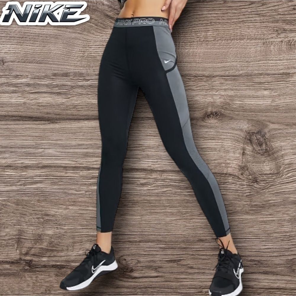 Nike Women’s Training Pro Dri-Fit leggings in black with logo band